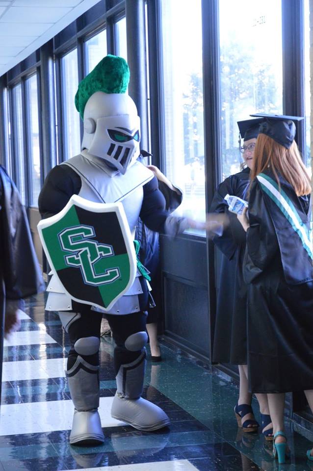 Seward County Community College – Louie the Saint (3) Knight mascot of the Seward County Community College interacting with students